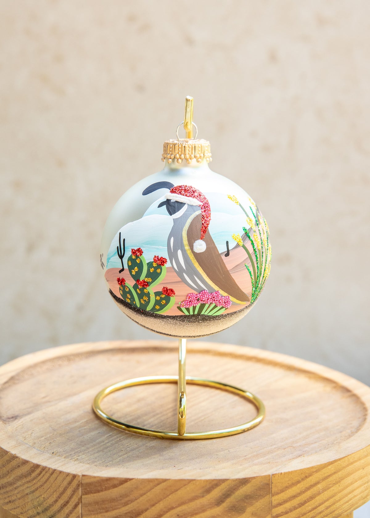 Desert Quail Hand Painted glass ornament by Brenda, Santa hat version