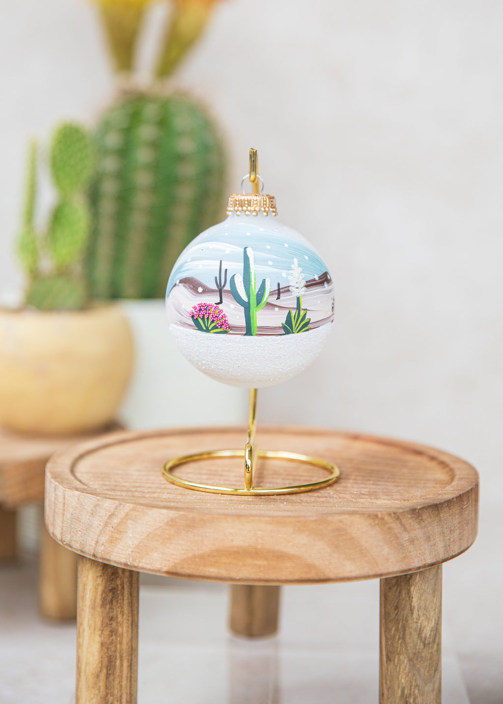 Snowy Desert Hand Painted glass ornament by Brenda