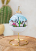 Snowy Desert Hand Painted glass ornament by Brenda