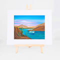 Saguaro Lake, Brenda's painting of Saguaro Lake winding through desert hills lined with saguaros and flowering cactus, shown as a matted 8x10 art print